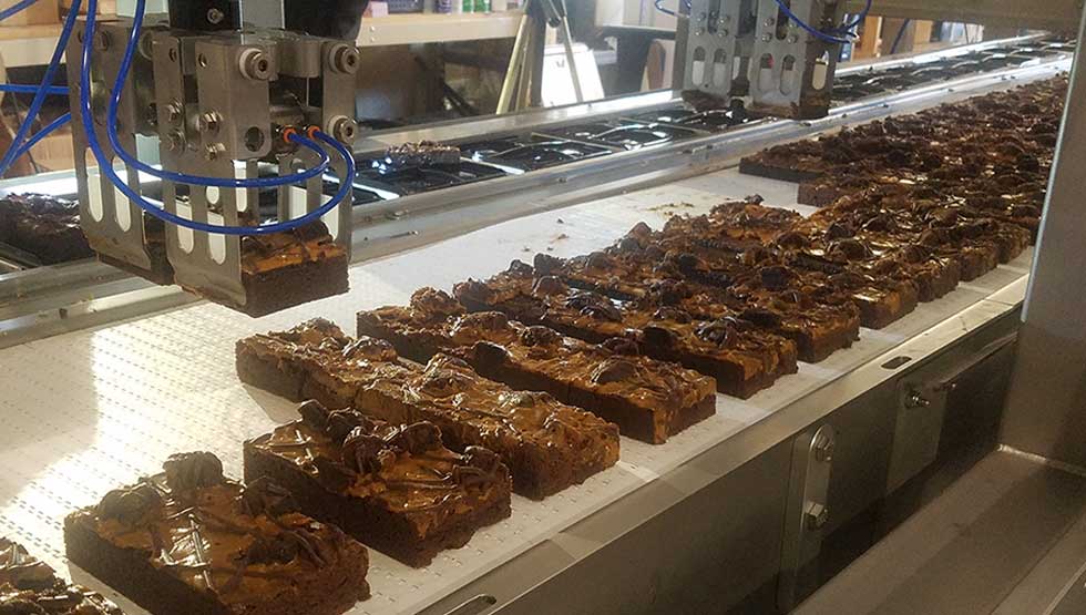 Xilix Systems: Automated Pan Sheet Cake Cutting and Robotic Packaging Solution including brownies, cakes, napoleons and more.